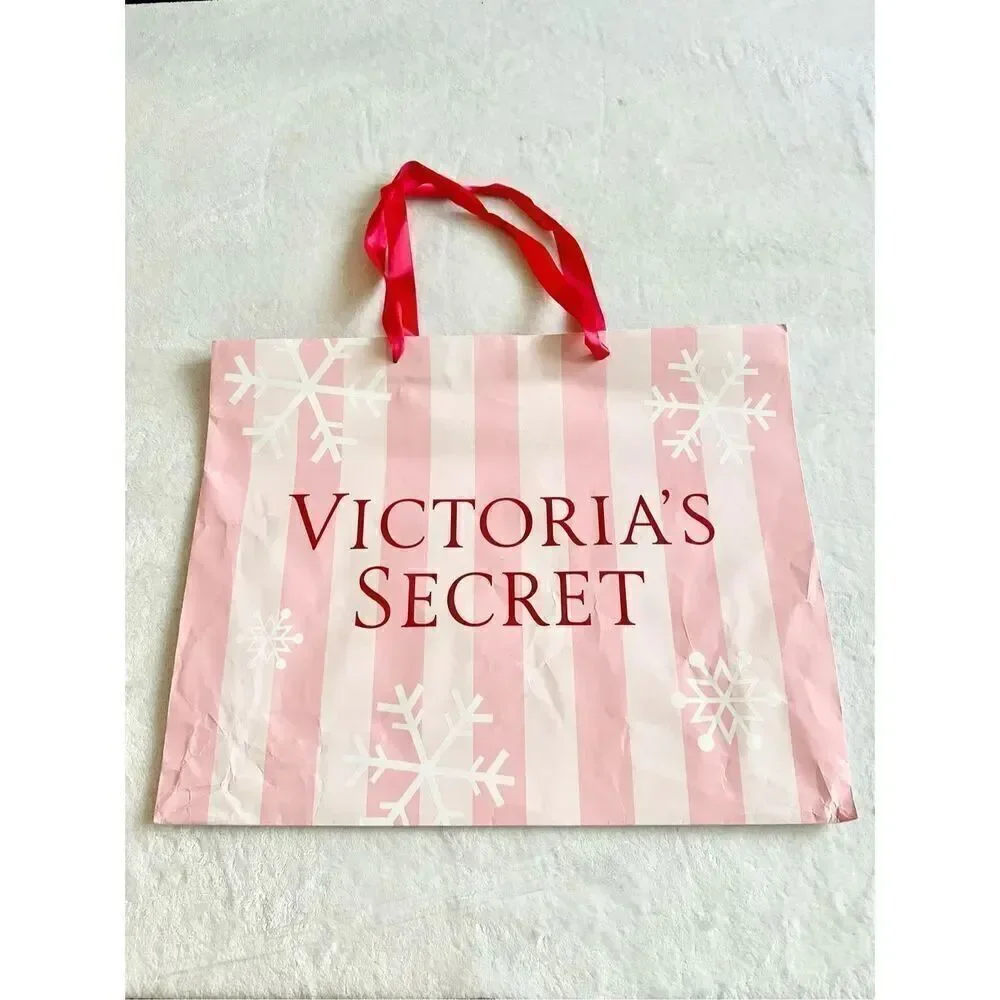 Victoria’s Secret large holiday light pink and red gift bag tote with snowflakes